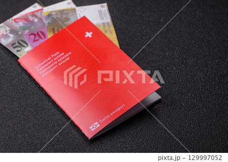 Swiss passport for travelling, flying and doing business. Switzerland document 129997052