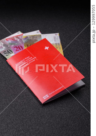 Swiss passport for travelling, flying and doing business. Switzerland document 129997055