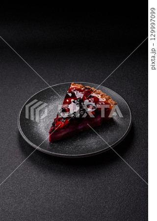 Pie, cheesecake with mascarpone, raspberries and blackberries. Cheesecake with cheese 129997099