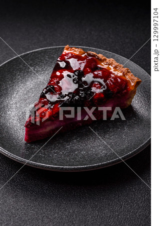 Pie, cheesecake with mascarpone, raspberries and blackberries. Cheesecake with cheese Pie, cheesecake with mascarpone, raspberries and blackberries. Cheesecake with cheese 129997104