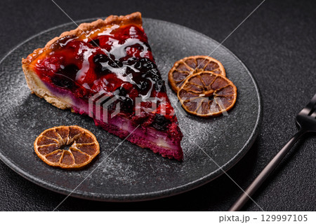 Pie, cheesecake with mascarpone, raspberries and blackberries. Cheesecake with cheese 129997105