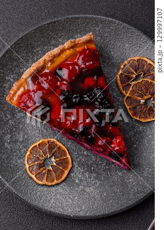 Pie, cheesecake with mascarpone, raspberries and blackberries. Cheesecake with cheese 129997107
