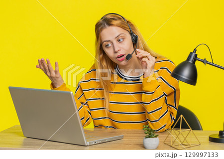 Woman freelance worker call center or support service operator helpline having talk with client Woman freelance worker call center or support service operator helpline having talk with client 129997133