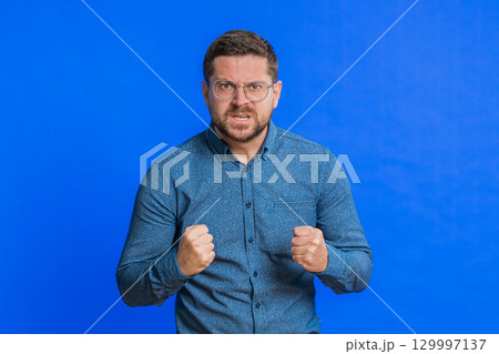 Upset frustrated annoyed man in indignant expression, quarreling, asking reason of conflict 129997137