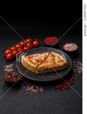 Quiche, salmon pie, broccoli, cheese. Quiche tart with fish and vegetables, cheese 129997261