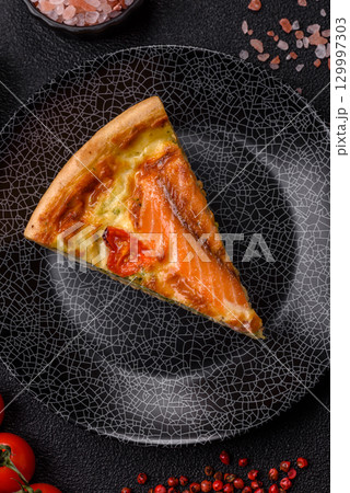 Quiche, salmon pie, broccoli, cheese. Quiche tart with fish and vegetables, cheese 129997303