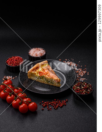 Quiche, salmon pie, broccoli, cheese. Quiche tart with fish and vegetables, cheese 129997309