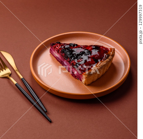 Pie, cheesecake with mascarpone, raspberries and blackberries. Cheesecake with cheese 129997319