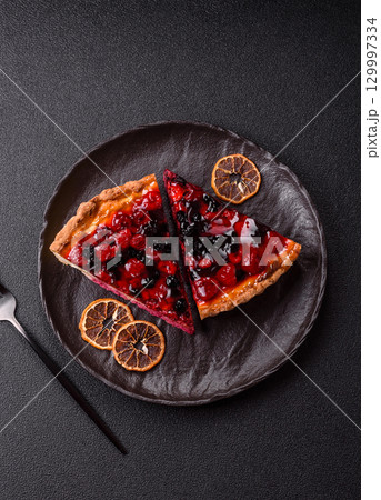 Pie, cheesecake with mascarpone, raspberries and blackberries. Cheesecake with cheese 129997334