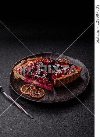 Pie, cheesecake with mascarpone, raspberries and blackberries. Cheesecake with cheese 129997335