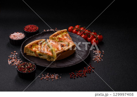 Quiche, salmon pie, broccoli, cheese. Quiche tart with fish and vegetables, cheese 129997408