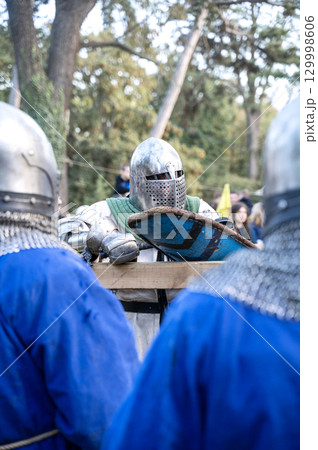 a man in the costume of a medieval knight a man in the costume of a medieval knight 129998606
