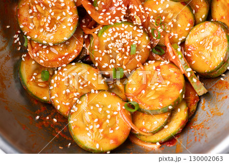 Korean cucumber salad (Oi muchim) in bowl, Korean side dish Korean cucumber salad (Oi muchim) in bowl, Korean side dish 130002063