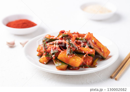 Korean kimchi cucumber on white background, Korean side dish, Homemade food Korean kimchi cucumber on white background, Korean side dish, Homemade food 130002082