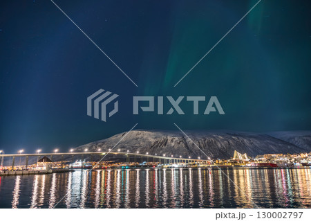 Tromso Norway, aurora borealis northern lights at city sentrum skyline harbor 130002797