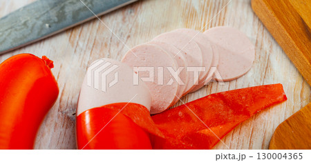 Mortadella - boiled sausage from Bologna. Mortadella - boiled sausage from Bologna. 130004365