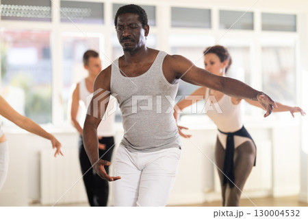 Group of dancers rehearsing ballet dance Group of dancers rehearsing ballet dance 130004532