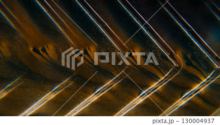 Paint spill. Geometric angle. Defocused yellow neon color particles flow water dark black pigment floating on abstract acrylic art background. Paint spill. Geometric angle. Defocused yellow neon color particles flow water dark black pigment floating on abstract acrylic art background. 130004937
