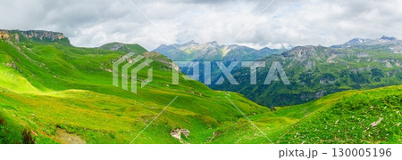 Grossglockner, Austria Breathtaking Panorama of Lush Green Alpine Meadows and Distant Peaks Grossglockner, Austria Breathtaking Panorama of Lush Green Alpine Meadows and Distant Peaks 130005196