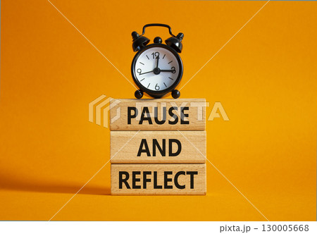 Pause and Reflect symbol. Concept words Pause and Reflect on wooden blocks. Beautiful orange background with alarm clock. Business and Pause and Reflect concept. Copy space. Pause and Reflect symbol. Concept words Pause and Reflect on wooden blocks. Beautiful orange background with alarm clock. Business and Pause and Reflect concept. Copy space. 130005668