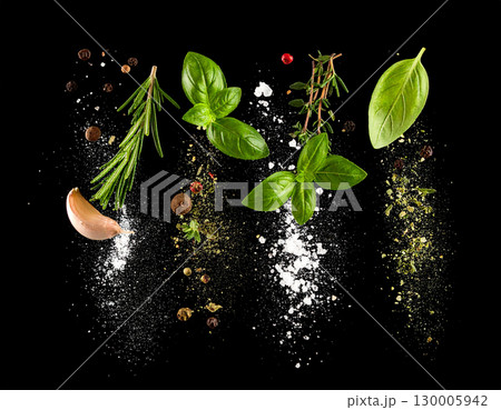 AI generated Rosemary oregano thyme black pepper and salt burst in whole and powdered forms colliding dramatically midair against pure black background Perfect for gourmet cooking meat preparation 130005942