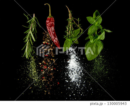 AI generated Rosemary oregano thyme black pepper and salt burst in whole and powdered forms colliding dramatically midair against pure black background Perfect for gourmet cooking meat preparation 130005943