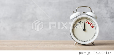 Happy New Year with vintage alarm clock and 2025 change to 2026 number. Merry Christmas, New Start, Resolution, countdown, Goals, Plan, Action and Mission Concept 130008137