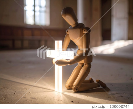 神聖な場所で祈るデッサン人形 130008744