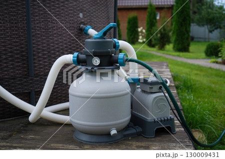 System pump of filtering, ozonation equipment for maintaining clean an outdoor swimming pool filtration system 130009431