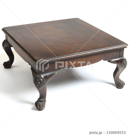 Wooden table with four legs and a carved design 130009553