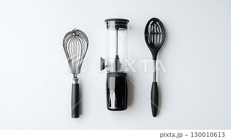 A black and silver whisk, a black and silver mixer, and a black 130010613