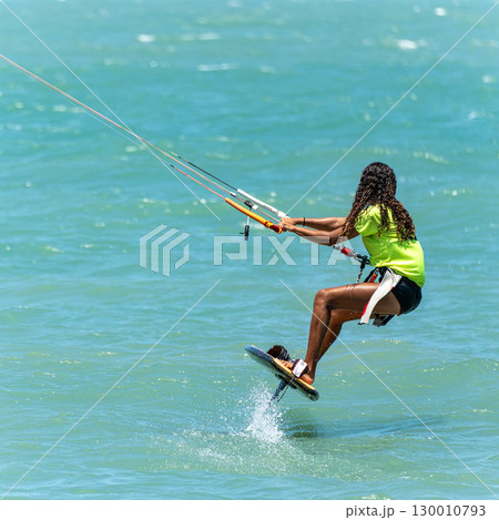 Kite surfing at Barra Grande beach on the coast of Piaui, northe 130010793