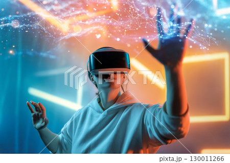Woman with VR virtual reality goggles Woman with VR virtual reality goggles 130011266