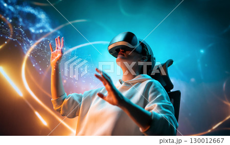 Woman with VR virtual reality goggles Woman with VR virtual reality goggles 130012667