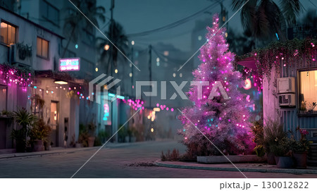 Vibrant Christmas tree adorned with pink and purple lights brightens quiet street at night, creating festive atmosphere 130012822