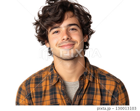 Young man with curly hair smiles happily in casual plaid shirt against white background 130013103