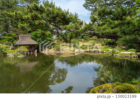 Traditional bridges in Shukkei-en Japanese garden in Hiroshima, Japan 130013199