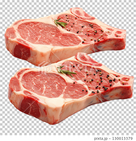 Freshly cut ribeye steaks ready for grilling with herbs and spices for a flavorful meal 130013379