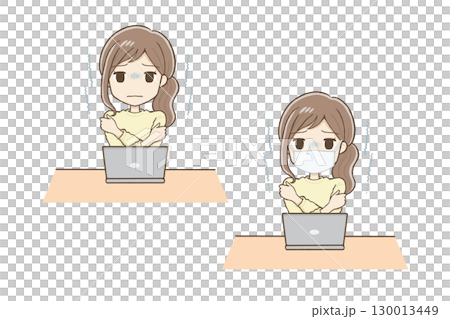 A woman in yellow clothes shivering in front of a computer 130013449