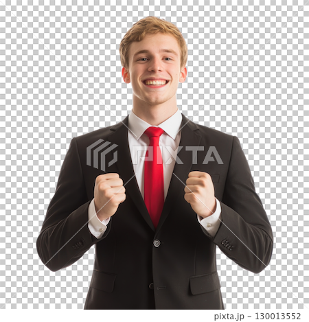 Young man in a suit celebrating with fists raised in a joyful gesture against a white background 130013552
