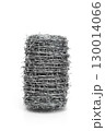 Roll of barbed wire isolated on white background, symbol of security, protection, and restriction. 130014066