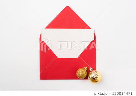 Red Christmas envelope with place for text on white background Red Christmas envelope with place for text on white background 130014471