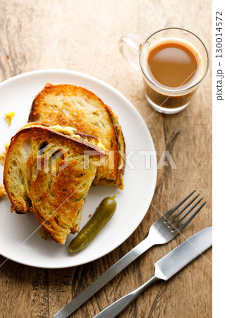 Grilled tuna and cheese sandwiches on sourdough bread. 130014572