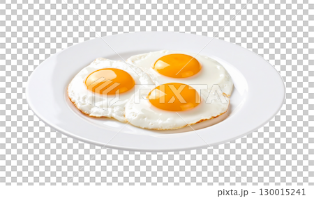 Three appetizing fried eggs are served on a white plate 130015241