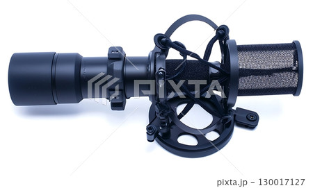 A microphone with a black cord and a black headpiece 130017127