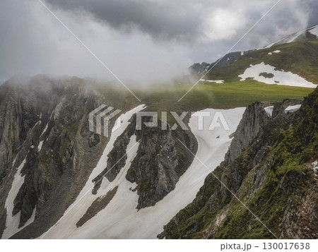 Mountain pass in the clouds. Mountain pass in the clouds. 130017638