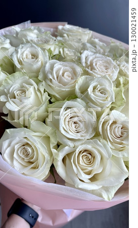 Elegant Bouquet of Pristine White Roses Wrapped in Soft Pink Paper 130021459