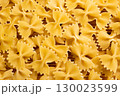 Dry farfalle pasta close-up. Top view. Traditional Italian cuisine 130023599