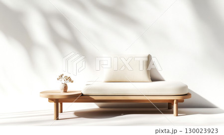 Minimalist wooden lounge chair with cushion and decorative vase in sunlit room 130023923