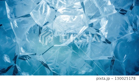 Translucent icy shards glowing with frosty light. 130025178